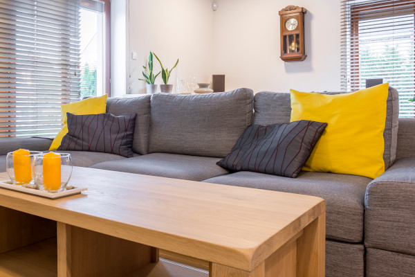 a grey and yellow lounge suite