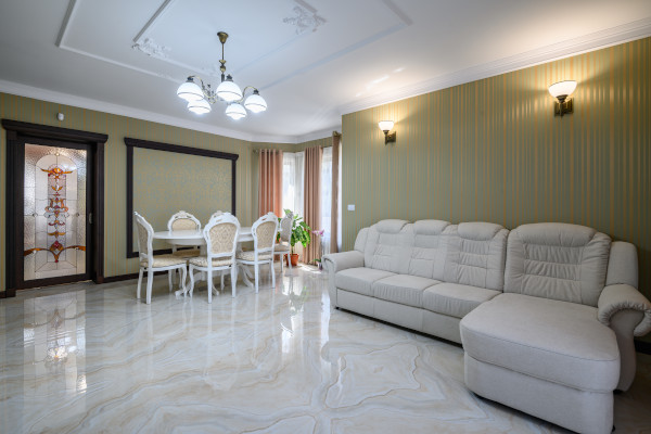 classic looking living room with light marble floors