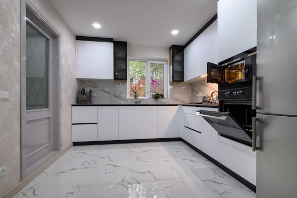 modern kitchen with light marble floors