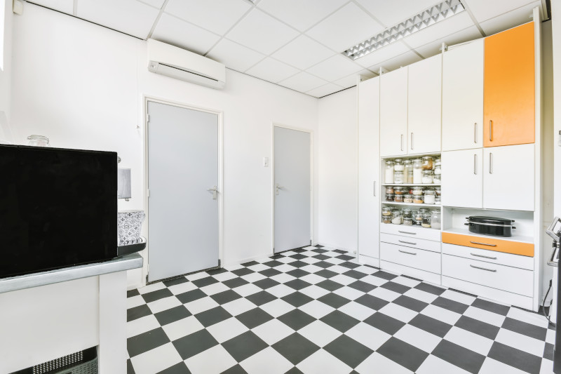 checkerboard linoleum floor in kitchen